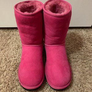 Pink UGGs with black sole